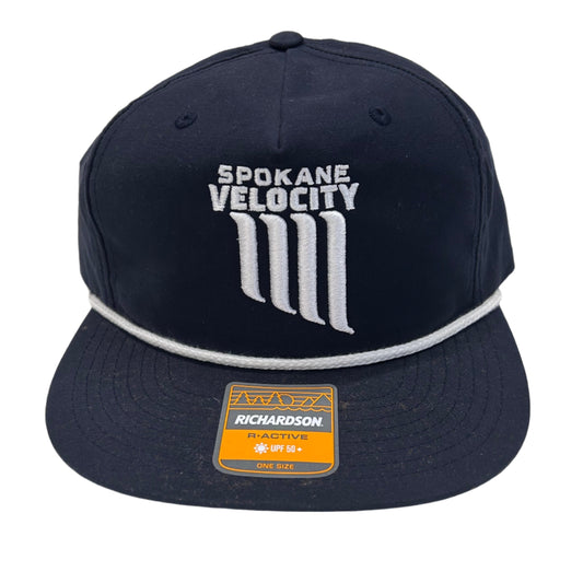 Navy blue cap with 'Spokane Velocity' logo on a white surface