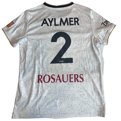 White sports jersey with 'Aylmer 2' and 'Rosauers' printed on it, laid flat on a surface.