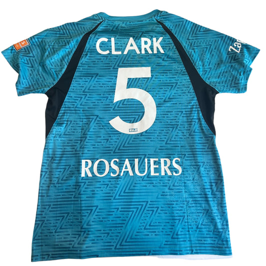 Blue sports jersey with 'CLARK 5 ROSAUERS' printed on it, laid flat on a surface.